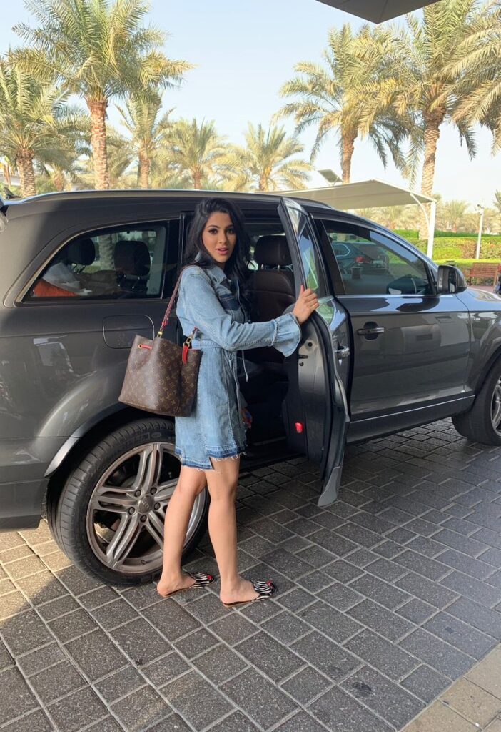 Nikki Tamboli with her luxurious car Audi Q5