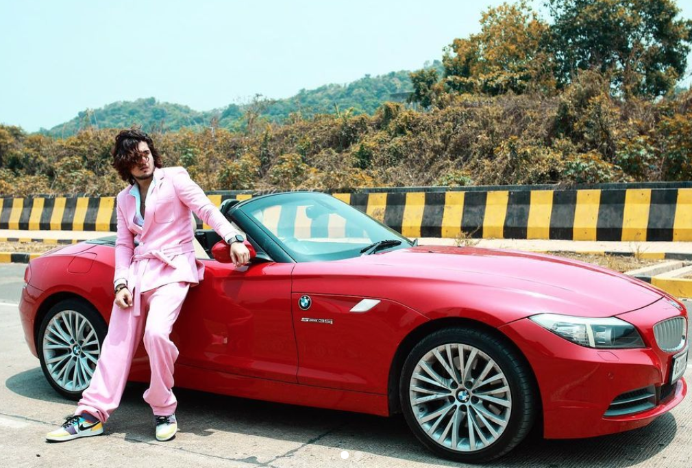 Bhavin Bhanushali Biography (Famous TikToker) - Tv Shows, Debut, Girlfriend 8 Bhavin Bhanushali's luxurious car - BMW Z4 - Red color