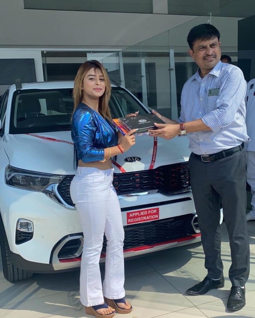 Ankita with Kia Car