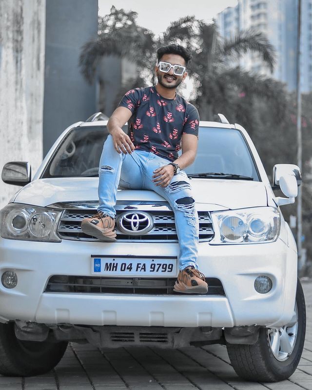 Sohail D with his White Fortuner Car