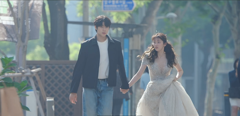 Episode 7 Scene - Lee Ji Han grabs Na Ah Jeong's hand while she is trying her wedding dress and rushes out of the room.